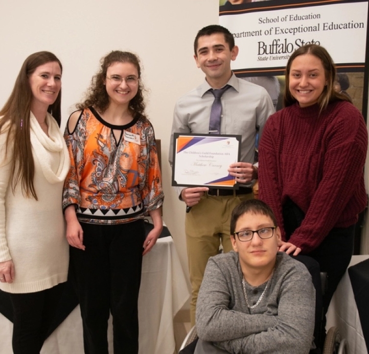 Five people with certificate