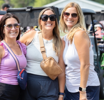 Three female golfers