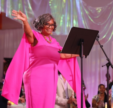 Bonita R. Durand, Ph.D., on stage at gala