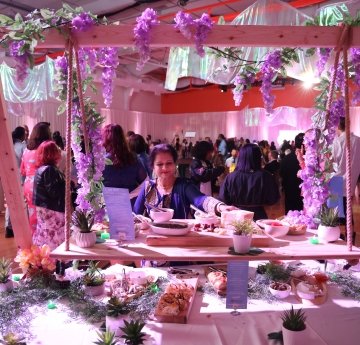 Woman in front of buffet station