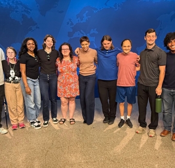 Professor with students