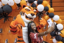 Benji the Bengal and student taking selfie
