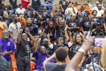 Group of people in stands ceering