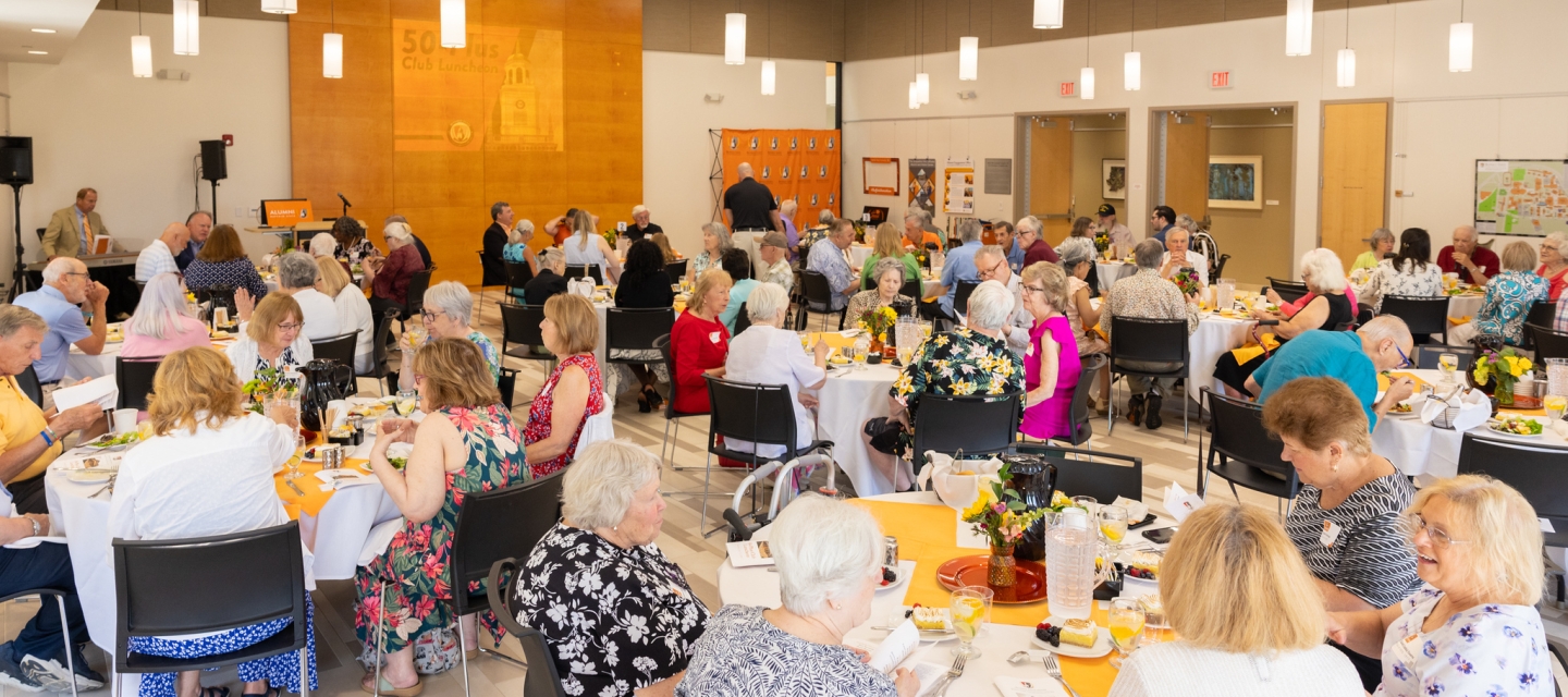 Alumni Center room full of event attendees