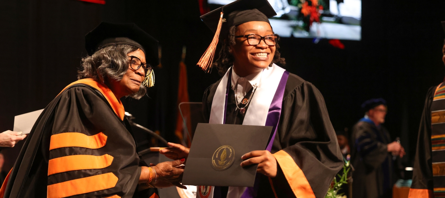 Graduate receiving diploma