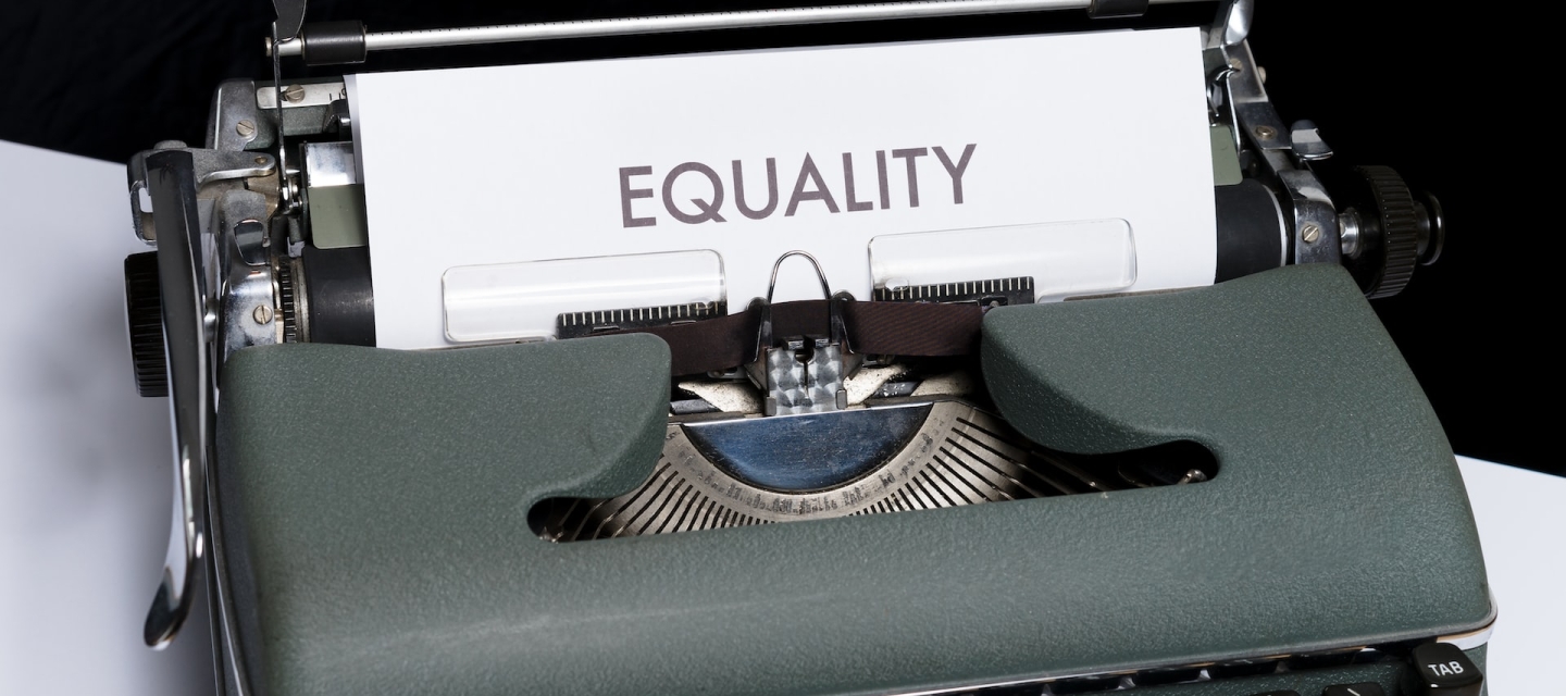 Old typewriter with word "Equality" typed on paper
