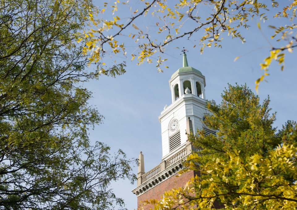 Rockwell Hall surrounded by lush green trees